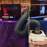 Children's Museum of Houston 3D printer attached to a Sentry Air Model 300 Portable Fume Extractor at the Maker Faire.